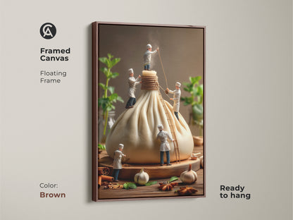 Brown framed canvas art of tiny chefs crafting a giant dumpling. This floating frame adds warmth to the culinary artwork. The print is ready to hang and brings a cozy feel to your kitchen wall decor.