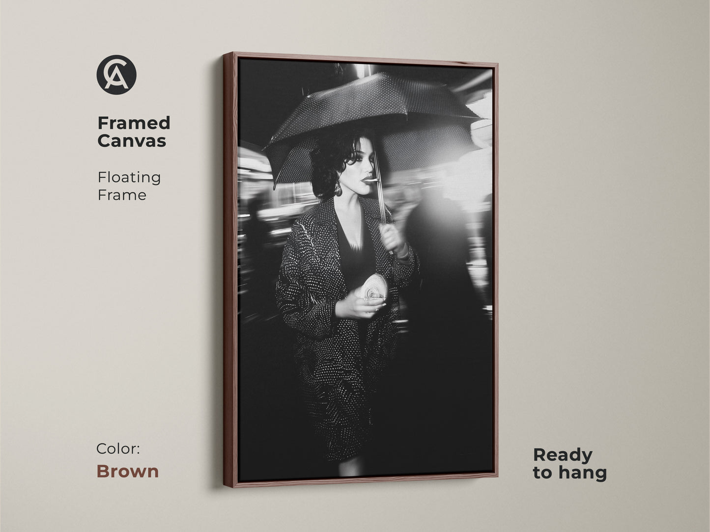 Elevate your decor with this framed canvas art. The brown floating frame enhances this black and white artwork. This street photography print arrives ready to hang. Showcase a woman with an umbrella. It adds urban chic to your home. This makes a sophisticated addition for any space.