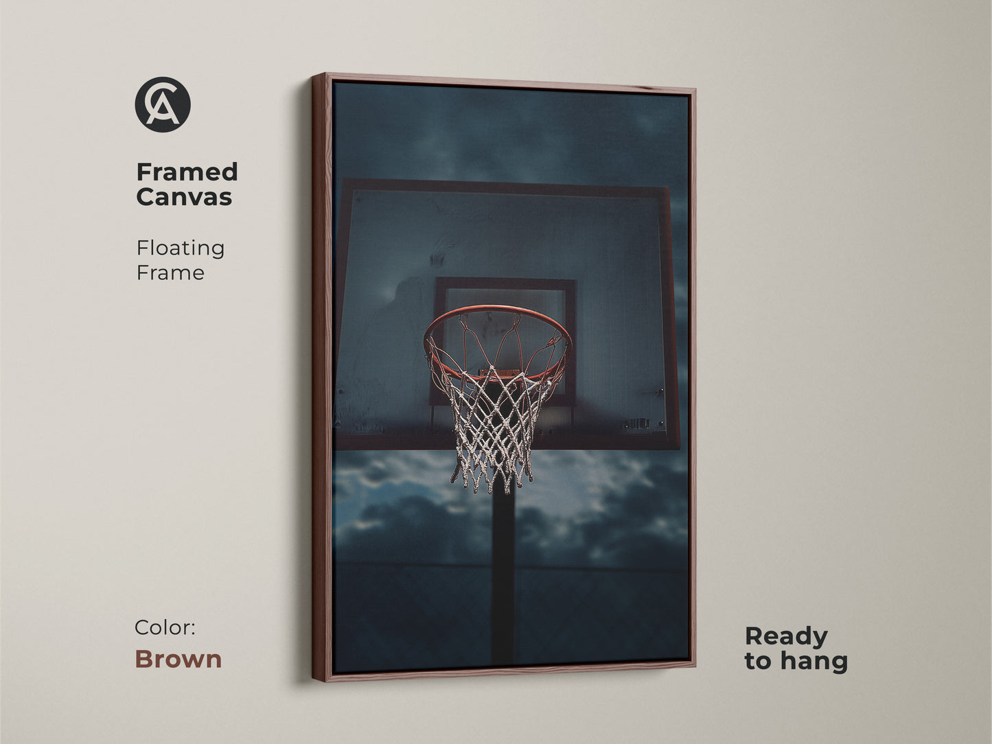 Framed canvas with a floating frame featuring basketball art. Great sports fan wall decor or birthday gift for a basketball player. The basketball hoop artwork is ready to hang. The artwork has a brown frame.