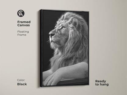 Framed black and white lion canvas art with a floating frame. This regal animal artwork arrives ready to hang. Elevate your study room decor or office wall art with this majestic lion canvas.