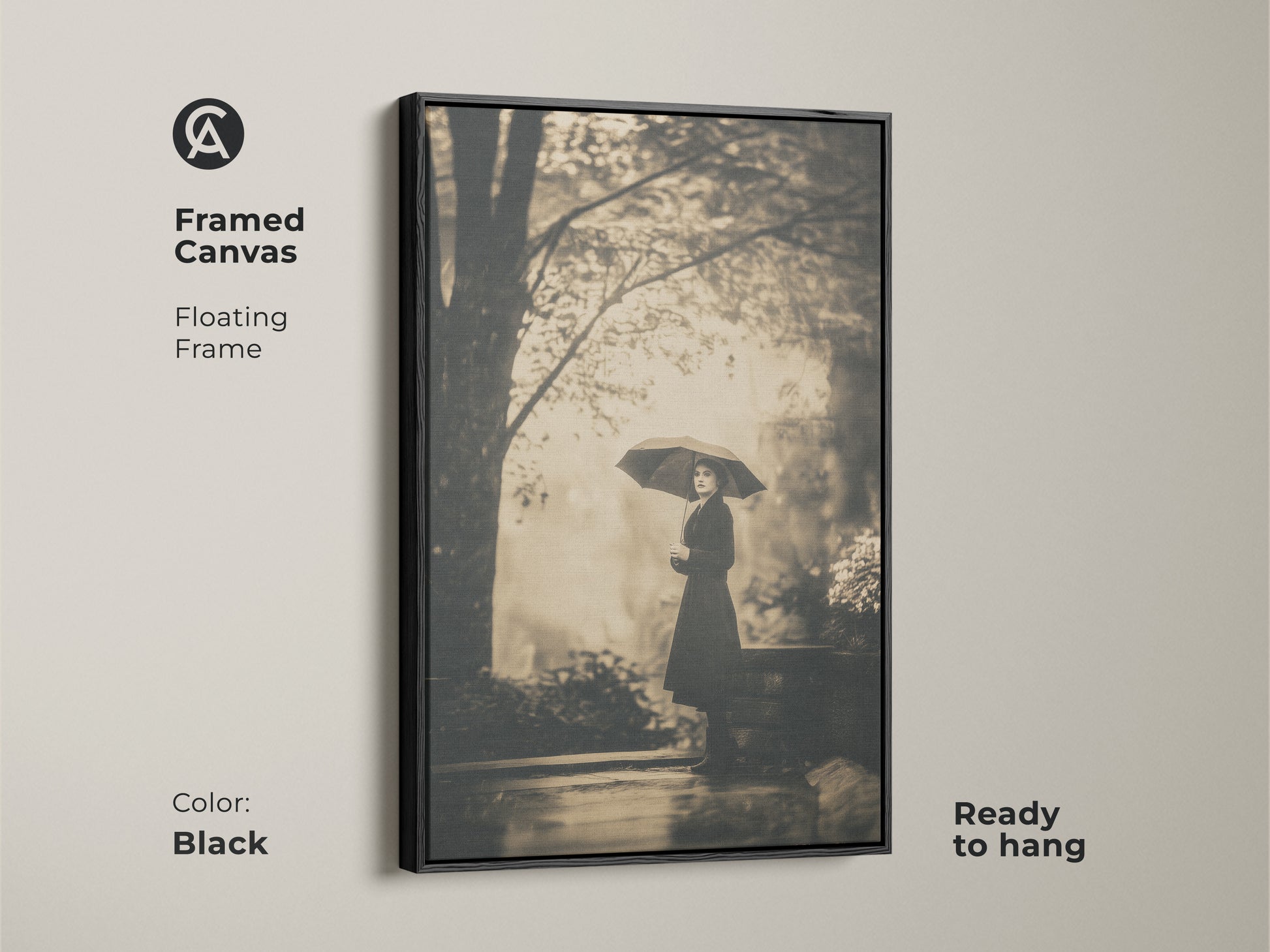 Framed canvas featuring a woman with an umbrella. This floating frame art is ready to hang. The black frame complements the monochrome artwork. Enhance your home with this framed canvas print.