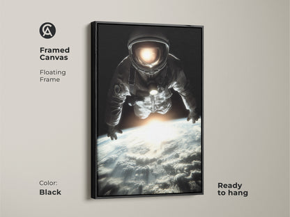Framed canvas art featuring an astronaut floating in space. The black floating frame enhances the cinematic Earth view decor. Ready to hang. This photorealistic astronaut art is a stunning addition to any room. The black blue white colors add a modern touch. A unique gift for space lovers.