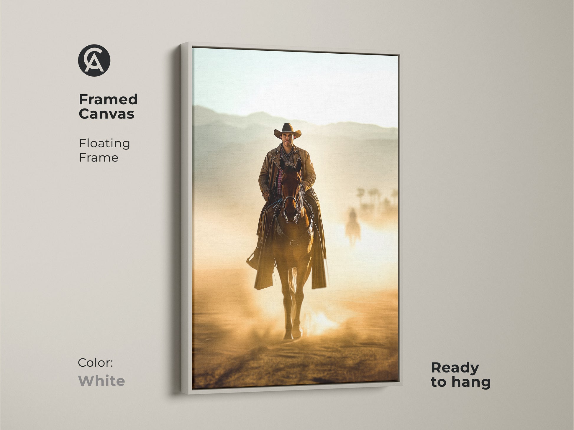 Framed canvas artwork featuring a Western cowboy on horseback. The floating frame is white and ready to hang. A cowboy rides in a dusty tan landscape. This canvas art makes a great gift for horse enthusiasts.
