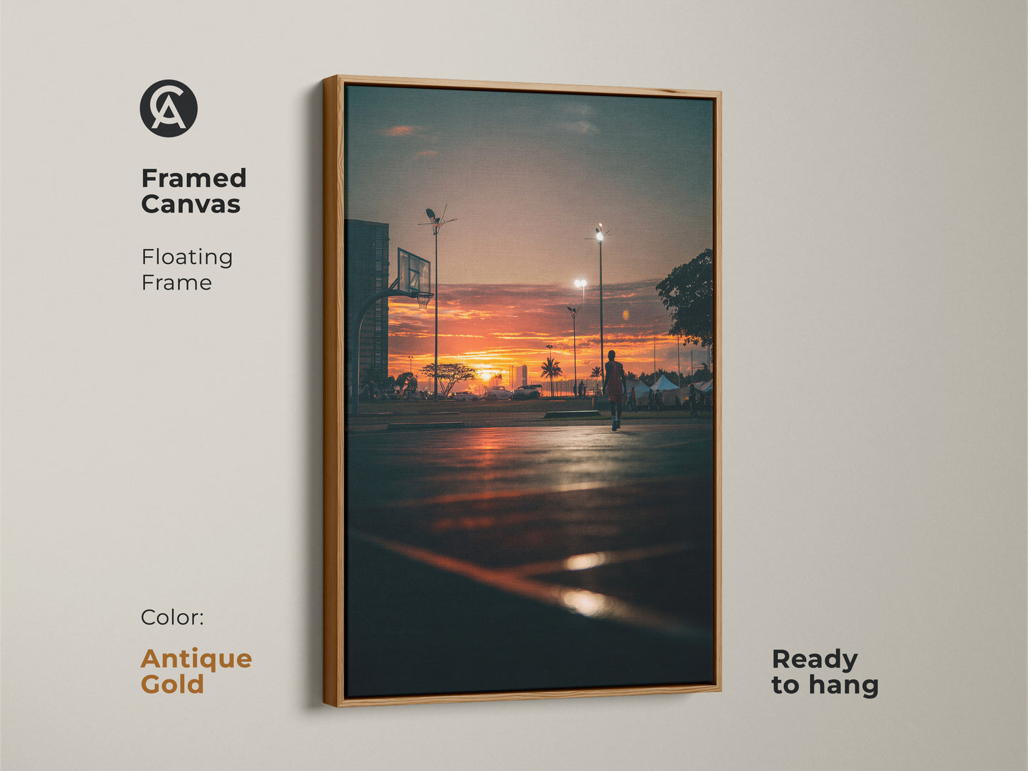 Framed canvas art capturing a sunset at a basketball court. The antique gold floating frame adds a touch of elegance. This ready-to-hang piece brings warmth to any space. 