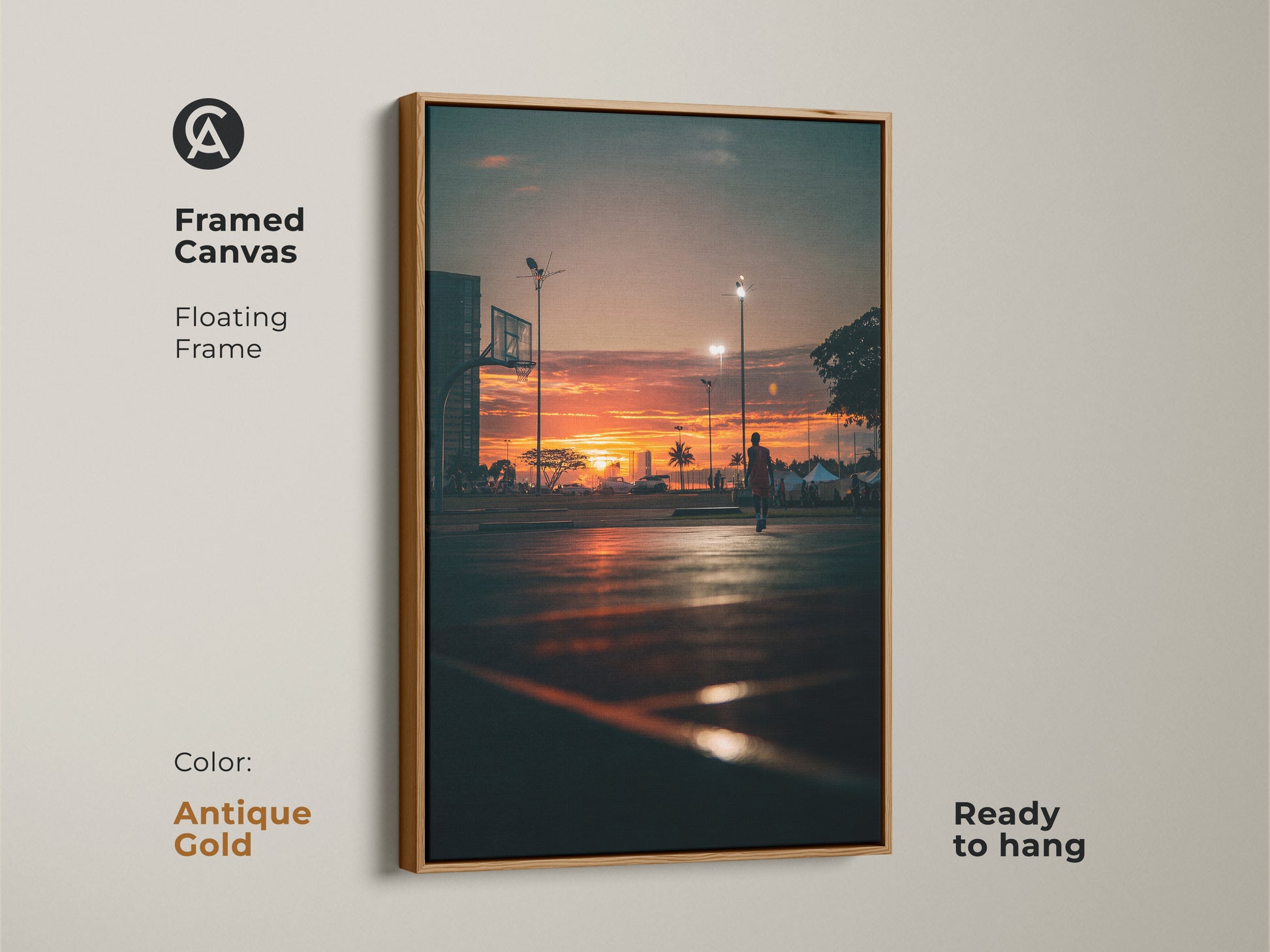 Framed canvas art capturing a sunset at a basketball court. The antique gold floating frame adds a touch of elegance. This ready-to-hang piece brings warmth to any space. 
