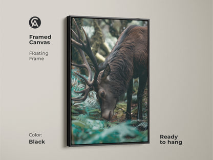 Framed canvas print of a majestic elk. This rustic forest green artwork brings wildlife into your home. The photorealistic deer nature decor is ready to hang. Perfect for a bedroom or living space. Black frame.
