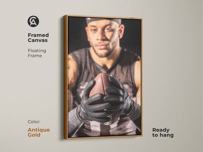 Antique gold framed canvas of an American Football player. Floating frame highlights the sports wall art. Ready to hang in any office or man cave. This athlete artwork makes a great gift for sports enthusiasts. Showcases an intense athlete portrait.