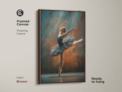 Framed canvas art of a ballerina in a brown floating frame. Ready to hang. The ballerina artwork features a dancer en pointe. She is wearing a blue tutu. The brown frame enhances the art's warm tones. This is a beautiful piece of ballet art.