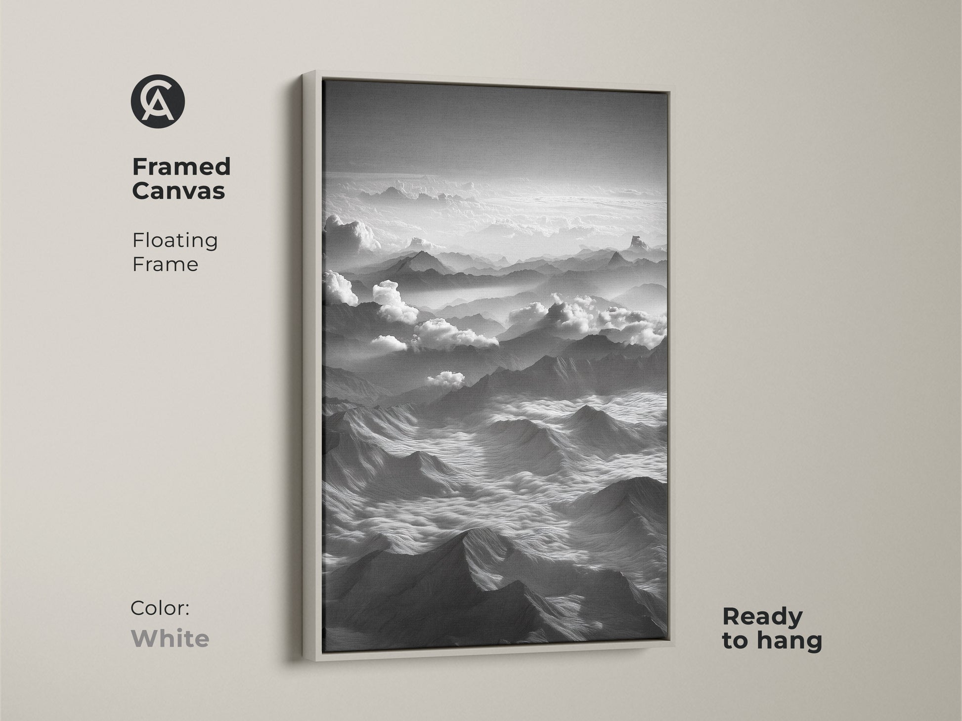 White framed canvas highlights monochrome mountain wall art. Aerial landscape displayed in black and white. Floating frame adds to this modern bedroom wall art. Minimalist landscape decor. This serene mountainscape canvas offers contemporary landscape decor.