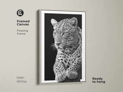 White framed canvas featuring a monochrome leopard. The floating frame enhances the nature inspired animal portrait. This minimalist black and white art makes a sophisticated wildlife decor statement. Buy Now!