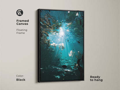 Framed canvas featuring underwater ocean wall art in a black floating frame. The deep blue fish canvas print is ready to hang. Ideal for a modern coastal artwork and a unique beach gift.