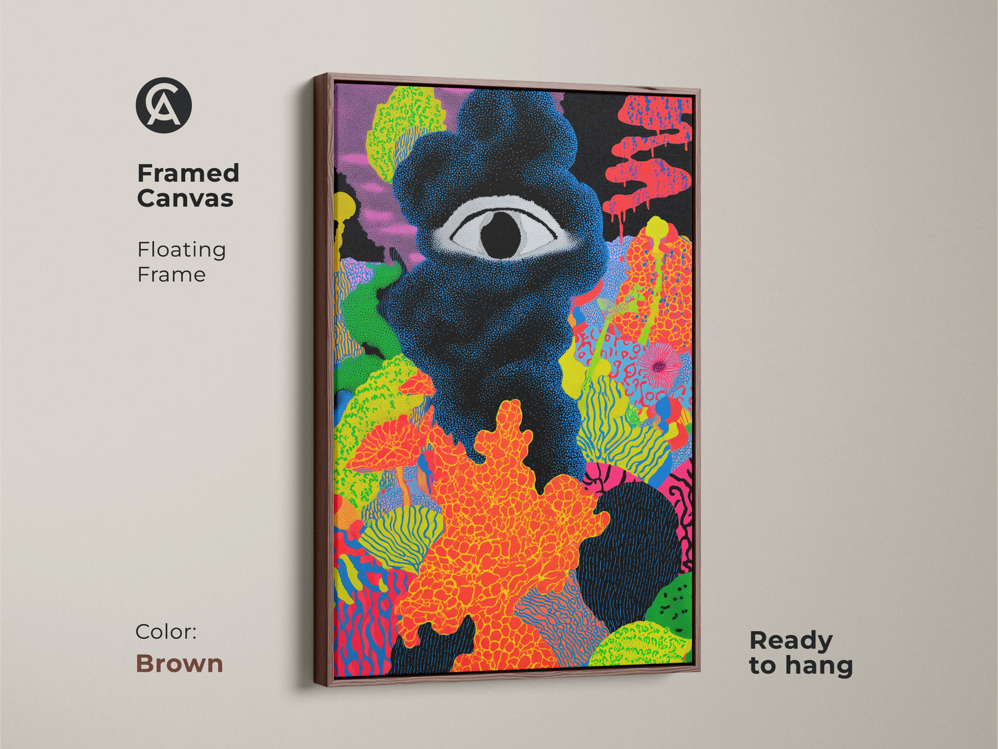 Framed canvas with brown floating frame displaying a surreal eye canvas print. The neon orange abstract art stands out as a vibrant art for office. This dotted style artwork is ready to hang. Great as an art collector gift.