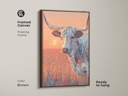Framed canvas of a longhorn in a field. The frame is brown and floating. The artwork is ready to hang. The colors are warm and inviting. A great piece for western art collectors.