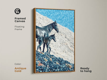 A framed canvas with floating frame displays a horse and foal. The sky blue landscape art offers rustic charm. This horse lover present is ready to hang in an antique gold frame. The frame color is antique gold.