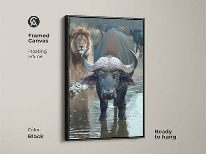 Framed in black this Buffalo and Lion wall art is an African wildlife canvas print. The safari animals artwork has a photorealistic style. This eclectic home decor is ready to hang. It's a dark blue and brown art piece. It's a great housewarming gift idea.