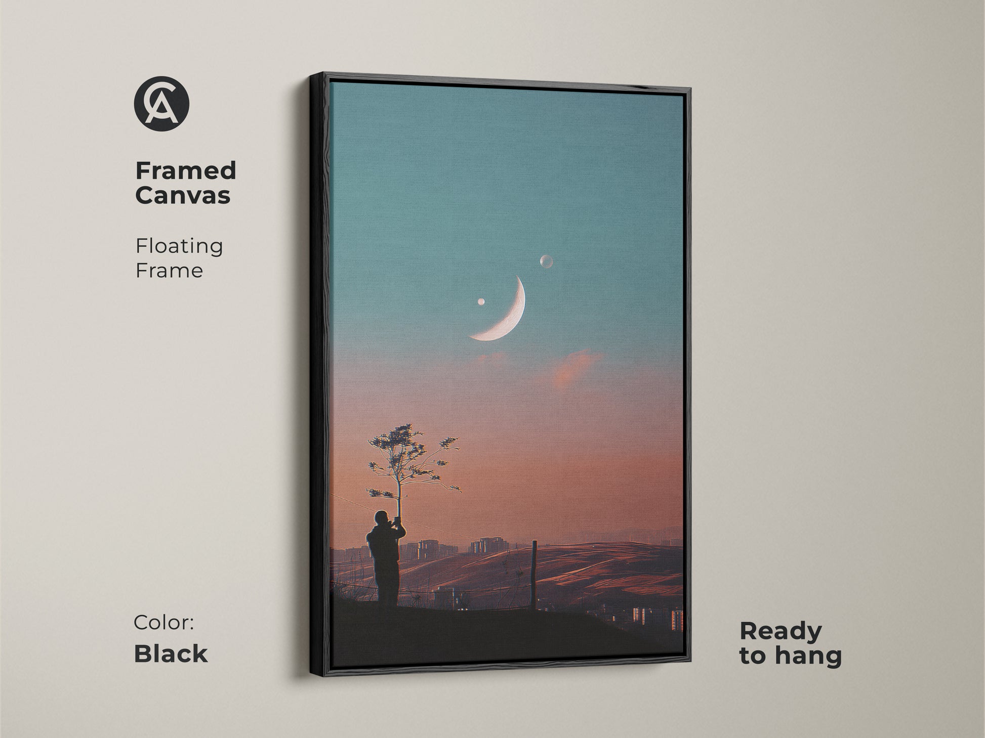 Framed canvas of surreal space artwork. Floating frame in black. This dreamy moon canvas art is ready to hang. Features a celestial landscape wall art. Perfect for modern bedroom decor. The fantasy tree silhouette print enhances any room.