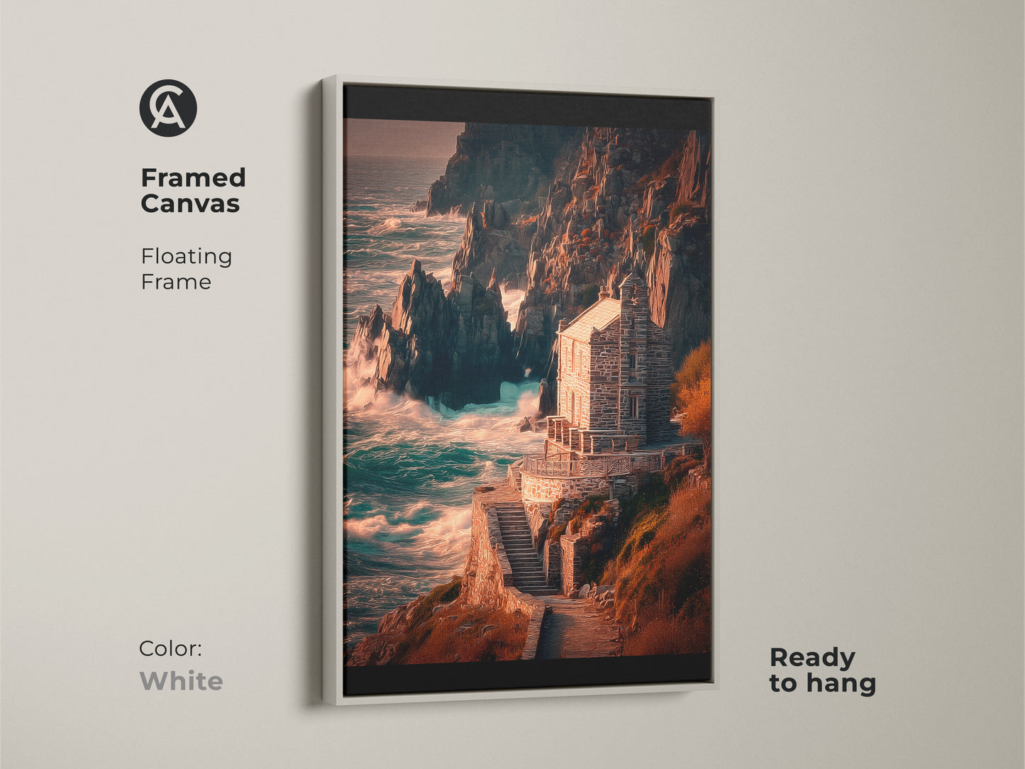 A white framed canvas art piece with a stone house on the coast. The floating frame enhances the deep blue teal ocean view. It is ready to hang as stunning coastal living room art.