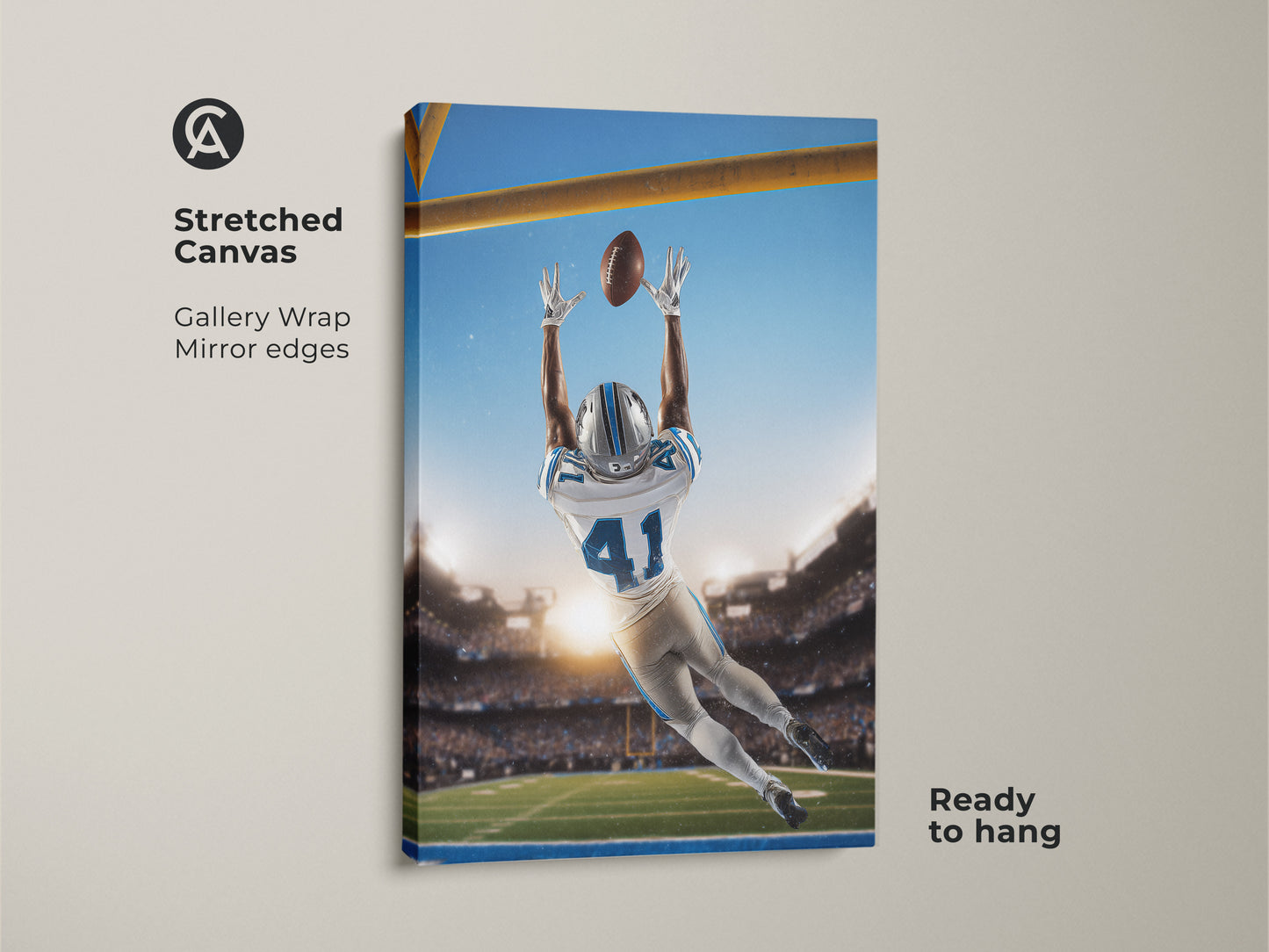 Experience the thrill with this football catch canvas art. This stretched canvas features mirror edges and is ready to hang. It's ideal action sports wall art for any room.