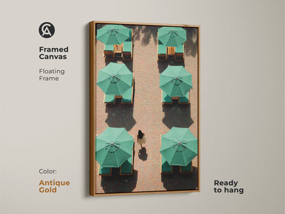 This framed canvas features minimalist green umbrella artwork. With a floating antique gold frame this contemporary travel art is ready to hang. Perfect as a minimalist entryway art this is a thoughtful housewarming gift.