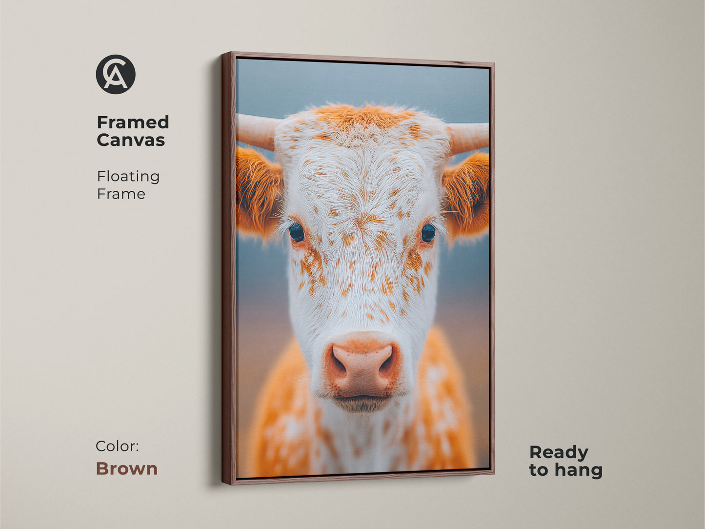 Framed canvas of a longhorn calf. The floating frame is brown. The art is ready to hang. This framed art offers a polished look. The canvas will elevate your home decor.