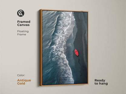 Framed canvas of aerial coastal waves. The floating frame enhances the deep teal beach wall decor. This minimalist red boat artwork is ready to hang. A modern seascape print brings coastal serenity to any room. Antique Gold frame.