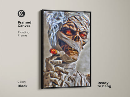 A framed canvas of a gothic horror mummy with a cigar. This dark fantasy artwork has a floating frame in black. The mummy has glowing red eyes. It's ready to hang. Perfect for a man cave or Halloween decor.