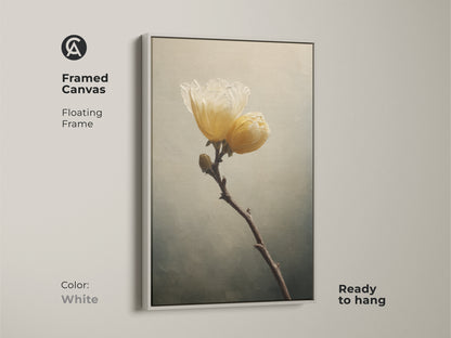 Framed canvas with floating white frame features delicate flower art print. This botanical art is ready to hang and offers a fresh look. The cream botanical wall art is perfect for the living room.