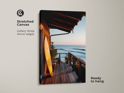 A stretched canvas print features a surfboard on a porch with an ocean view. The gallery wrap and mirror edges enhance the coastal artwork. This ready-to-hang piece brings a beach vibe. Ideal for adding a touch of the ocean to any room. It is a beautiful surf art piece.
