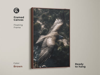 A brown framed canvas art print showing an eagle in flight. This rustic mountain landscape artwork is a wildlife bird of prey. It's ready to hang nature lover home decor.
