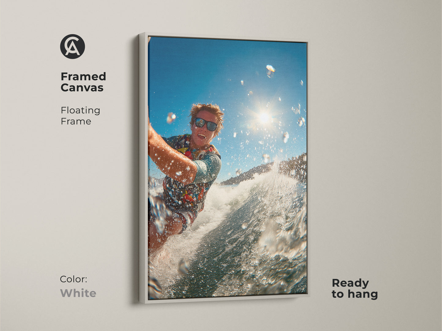 Framed canvas art of a surfer riding a wave is displayed. The white floating frame offers a clean modern look. Ready to hang this piece brightens any space. It's perfect for adding a fresh touch of action to your wall art.