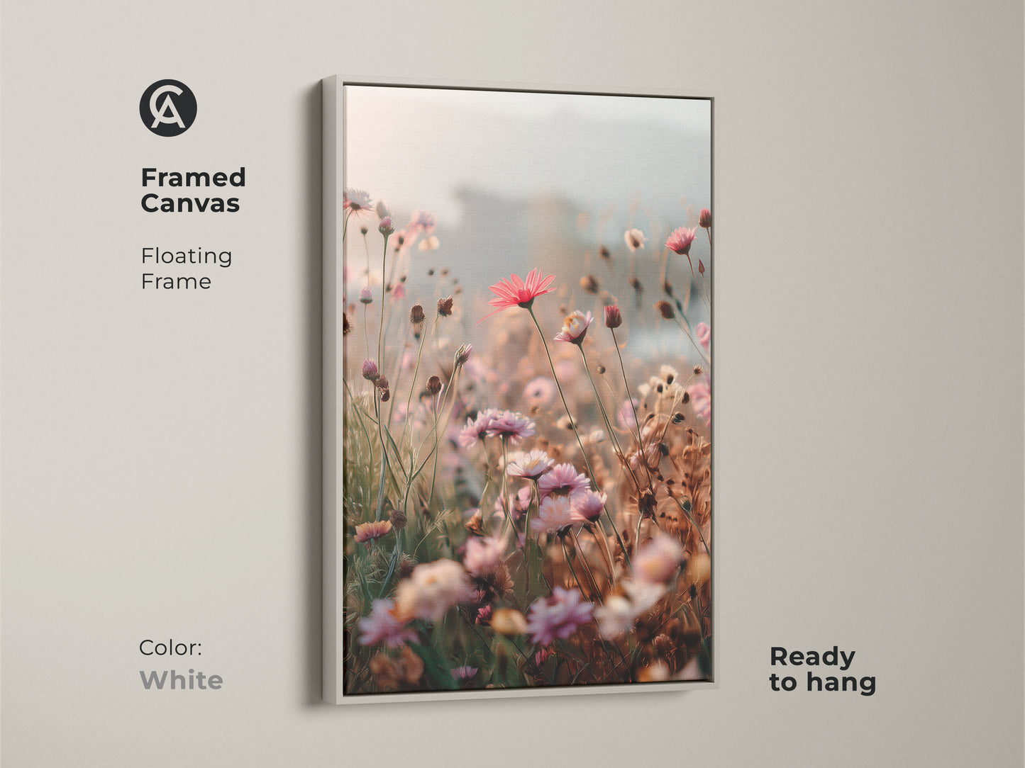 Framed Canvas in white with a floating frame showcasing Soft Focus Floral Art Print. This coral pink daisy and cosmos botanical wall art adds boho blush pink to any room. Ready to hang and makes a great housewarming gift.