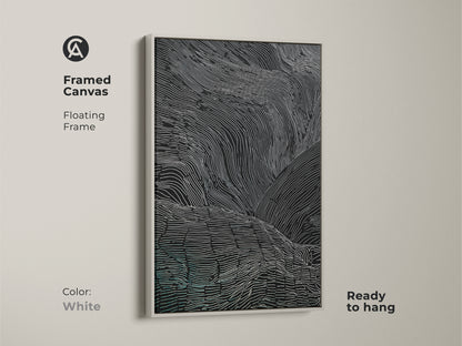 A framed canvas art has a white floating frame. The abstract wavy lines are in black white and teal. This modern artwork is ready to hang. The minimalist art is a stylish addition to any home. It is ideal for a modern bedroom.
