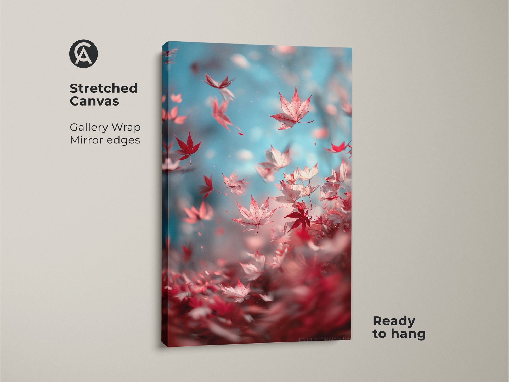 Stretched canvas art showcases vibrant red maple leaves on a blue backdrop. The gallery wrap features mirrored edges. This beautiful artwork is ready to hang adding a touch of nature to your home.