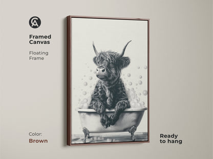 Brown framed canvas of a Highland cow in a bathtub. This floating frame is ready to hang. The black and white artwork adds warmth to any room. Perfect for farmhouse bathroom decor. A delightful gift for farm animal enthusiasts. This funny sketch brings a smile.