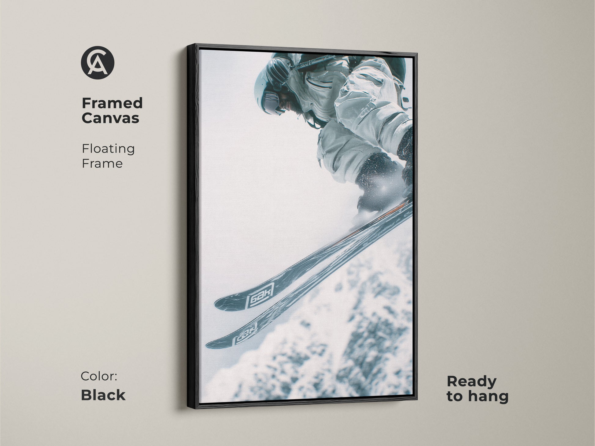 Framed canvas artwork featuring a skier mid-air. It has a black floating frame. The dark frame makes the art pop. Ready to hang and enjoy. A stylish addition to any space for ski lovers.