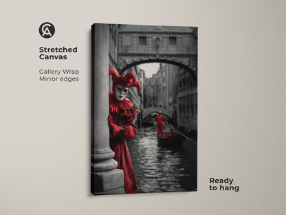 This is a Venice Carnival canvas print of a Red jester costume art. The masquerade ball artwork is ready to hang. This gallery wrapped canvas features mirrored edges. Theatrical wall art print is on stretched canvas. See the gondola canal in Venice.