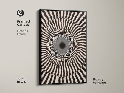 Framed Canvas of Black and White Abstract Art. This geometric swirl print creates an Op Art Concentric Circles wall decor. A contemporary piece that is ready to hang. The floating frame enhances the modern abstract artwork.