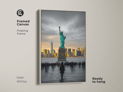 The framed canvas presents the Statue of Liberty and NYC skyline with a floating white frame. This contemporary artwork is ready to hang. The turquoise and gold accents complement modern decor. A great art for office space or home. Enhance your space with this iconic landmark wall hanging.