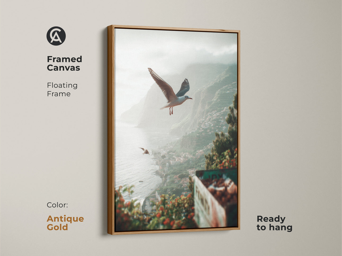 Antique gold frame around a teal green grey coastal art print with seagulls flying over a seaside town. The beach landscape wall decor is ready to hang as framed canvas art. Perfect as a travel gift for him this tranquil ocean art brings calming bedroom art.