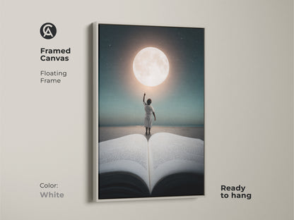 Framed canvas with a floating frame captures a child reaching for the moon. The white frame highlights this ready to hang artwork. Its celestial fantasy canvas adds a dreamy touch to your decor.