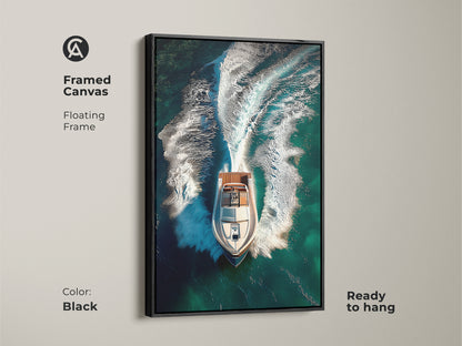 Framed canvas of a speedboat speeding on deep teal ocean water. This contemporary artwork features a floating black frame ready to hang. The aerial view captures the dynamic wake of the boat. Ideal for modern nautical home or office decor for boat enthusiasts.