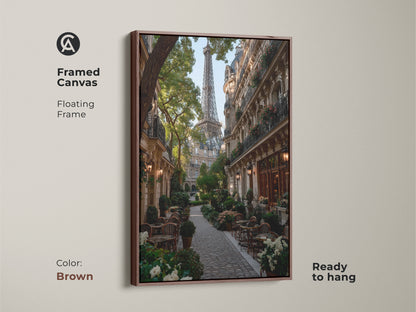 Framed Canvas of a Parisian street view with the Eiffel Tower. The brown floating frame complements this European cityscape art. Perfect as an anniversary gift art. Adds French country decor to any space.