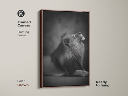Framed canvas featuring a photorealistic lion in a brown floating frame. This monochrome animal artwork is ready to hang. A contemporary lion artwork for bedroom or office decor. Elegant animal art print.