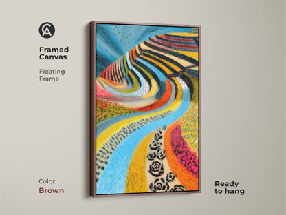 Framed canvas folk art landscape. The abstract blue river is showcased in a floating brown frame. Ready to hang this colorful artwork adds an eclectic touch. Perfect for a housewarming gift. This nature painting enhances any home. A vibrant unique wall art piece.