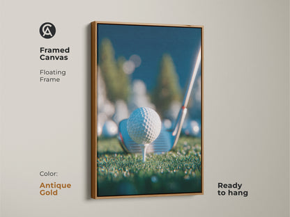 Framed canvas artwork in an antique gold floating frame shows a golf ball on a tee. It comes ready to hang. The print is ideal for golf lovers. Elevate your space with sporty sophistication. Order framed art now.