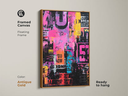 Framed canvas print of collage artwork. The artwork has bright pink yellow and blue colors. It features stenciled words and numbers. The frame is antique gold and floating. This canvas is ready to hang.