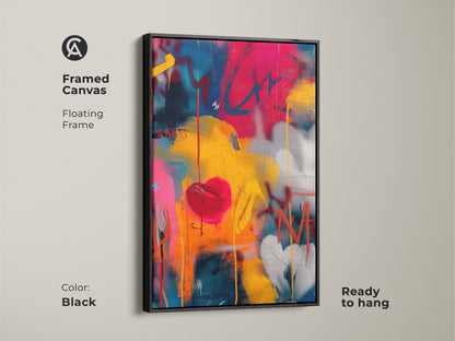Framed Canvas with a black floating frame showcasing graffiti heart artwork. This contemporary piece is ready to hang. The art brings a pop of urban style to your interior. The black frame enhances the colorful graffiti art.