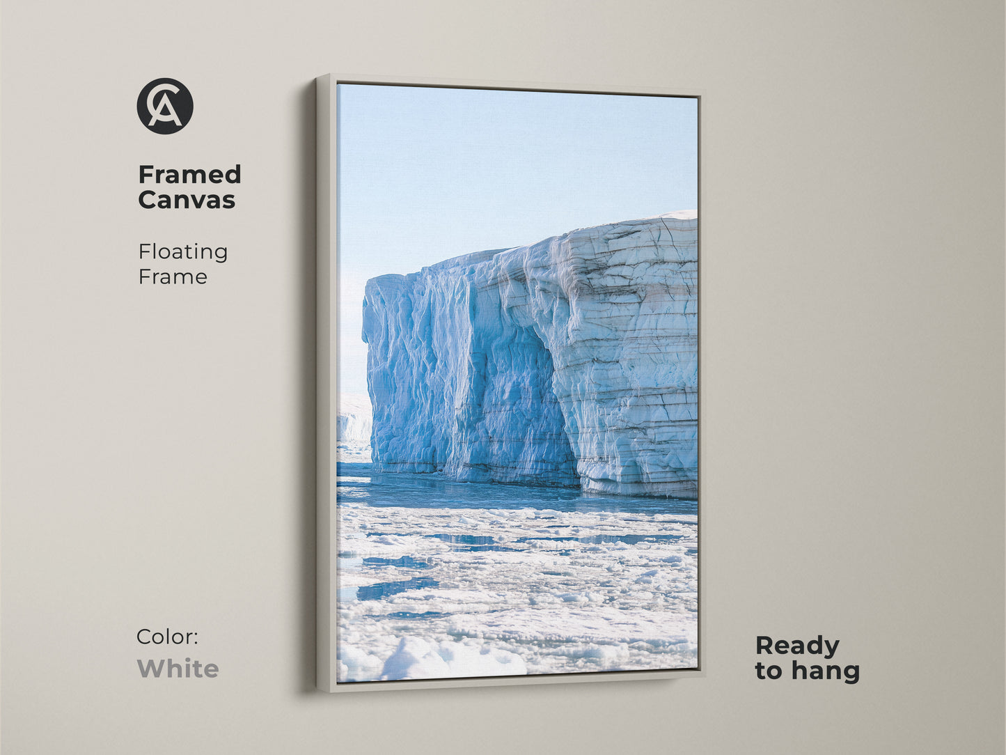 White framed canvas featuring a minimalist iceberg. The light blue canvas art is ready to hang. It brings a serene glacier scene to your home. This contemporary wall decor is perfect as a housewarming gift.