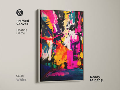 Framed canvas art featuring colorful abstract artwork. The floating frame is in a clean white color. This modern art print is ready to hang. The painting includes bold colors like pink yellow and blue. Brighten up your home with this framed canvas artwork. It's a contemporary art selection.