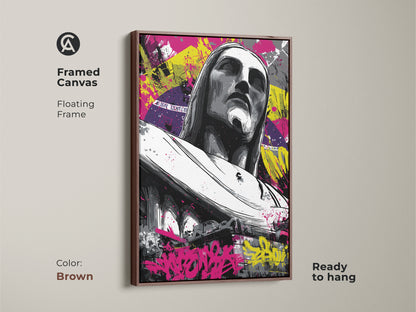 Framed canvas of Christ the Redeemer. The floating frame is brown. The art includes urban graffiti and abstract elements. A contemporary religious piece ready to hang. Great for eclectic wall art collections